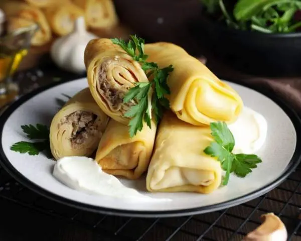 Pancakes with meat and egg